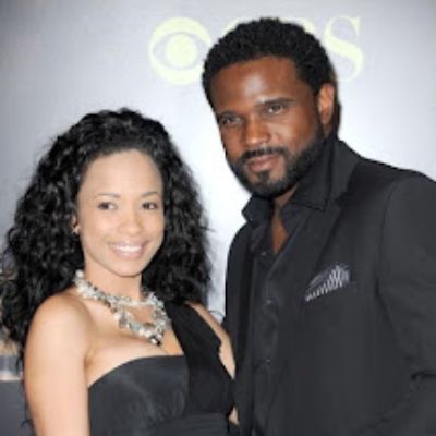 Darius Creston McCrary with his second wife Karrine Steffans in a black outfi